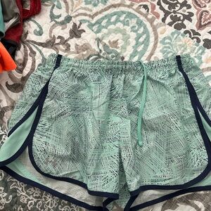 Under Armour Green and Blue Athletic Shorts with Curved Hem